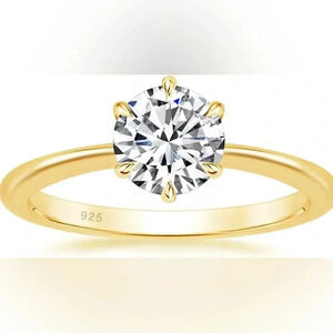 4 Cubic Zirconia Engagement Rings & 1 Wedding Band
